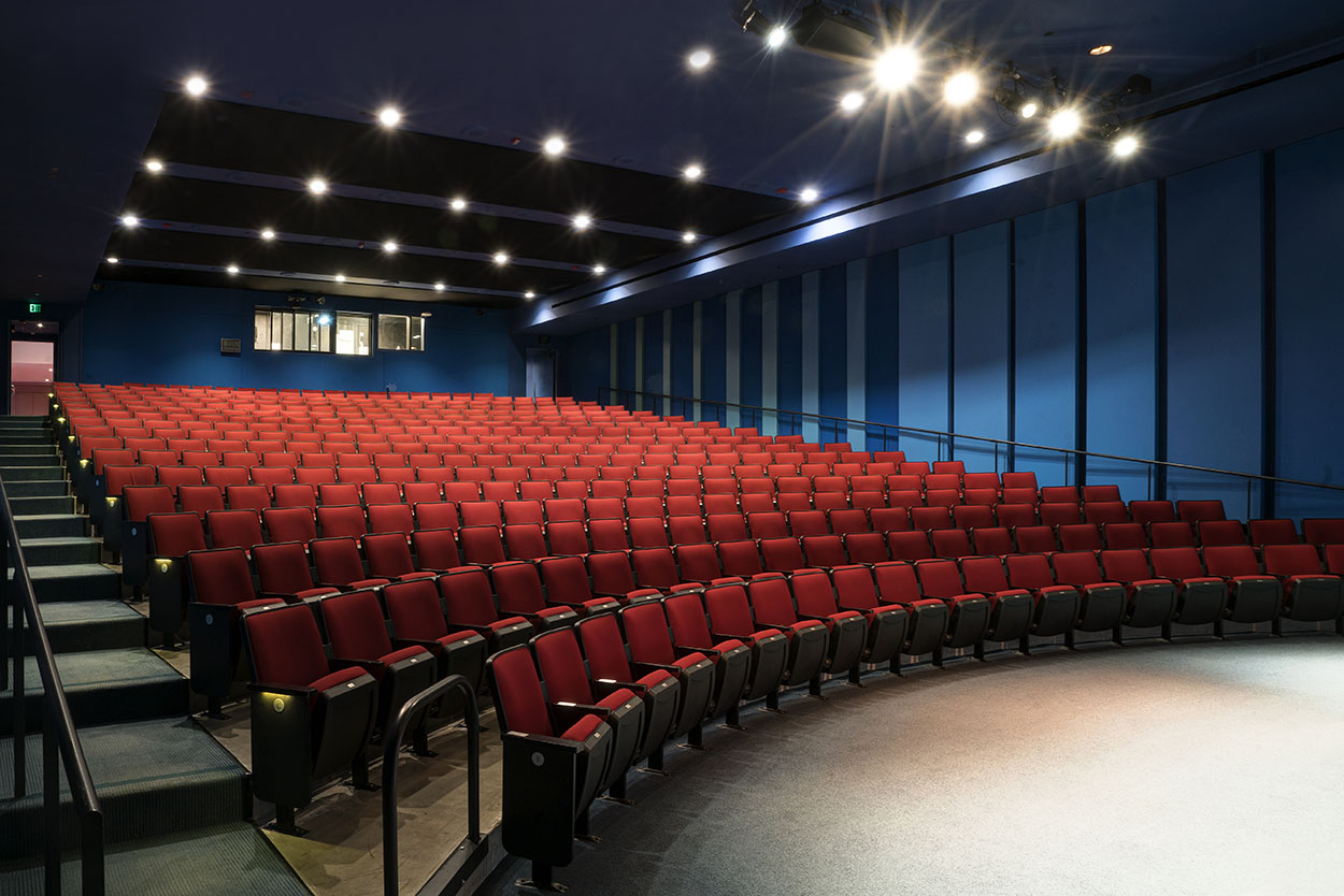 United States, Empty auditorium, rows of raked seats.